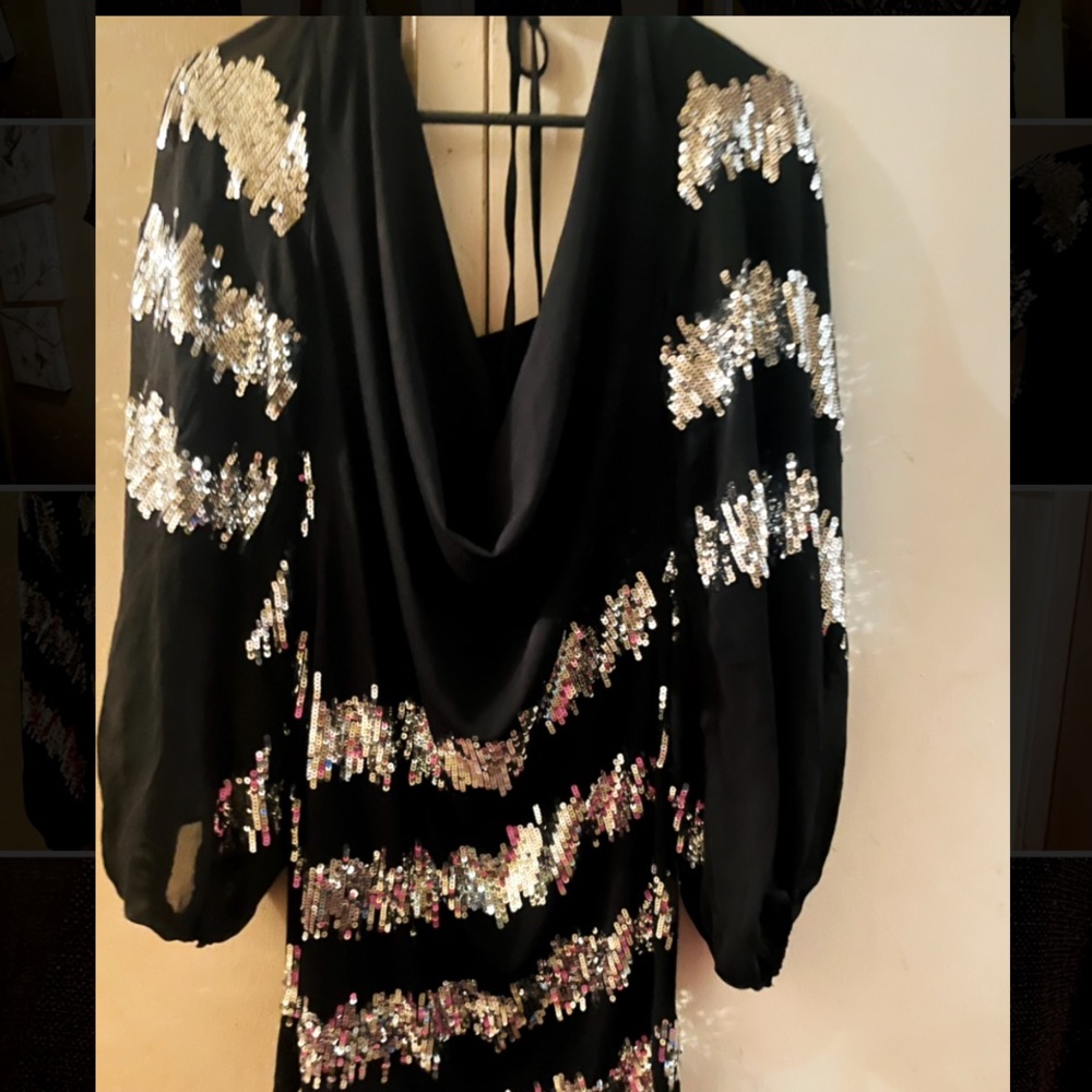 Black and Silver evening dress that drapes in the front with sheer sleeves